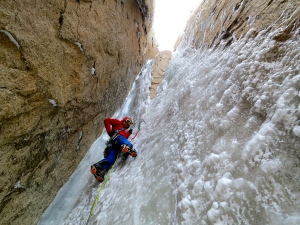 Smashing out the final vertical ice pitch